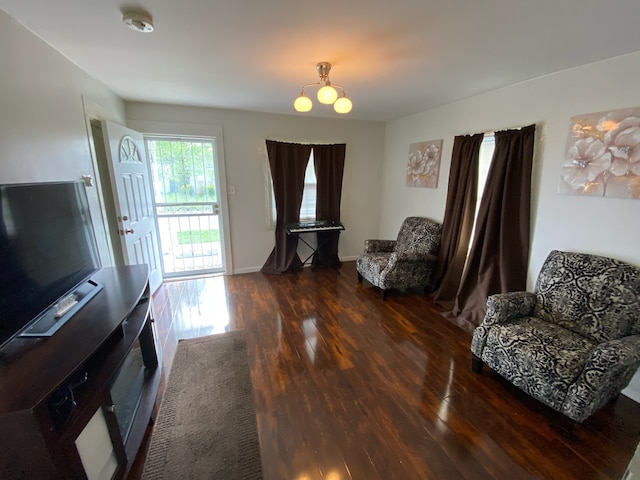 17029 Ridgewood Ave, Lansing, IL 60438 - sitting room with wood finished floors and a chandelier