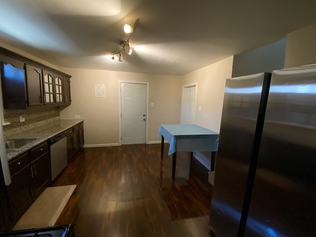17029 Ridgewood Ave, Lansing, IL 60438 - kitchen with stainless steel appliances, dark wood-type flooring, dark brown cabinetry, and light stone counters