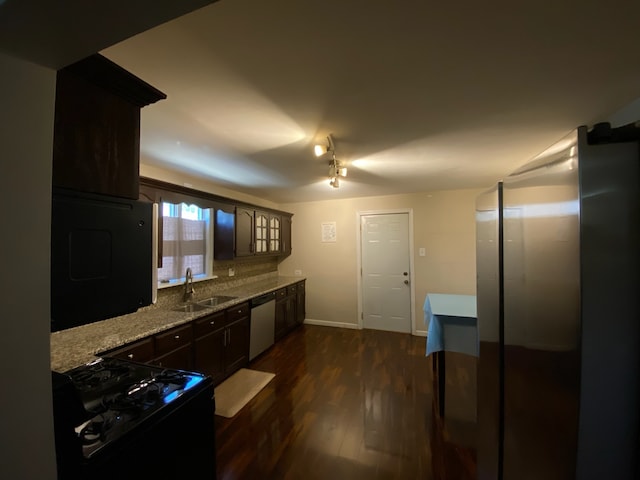 17029 Ridgewood Ave, Lansing, IL 60438 - kitchen featuring black gas range, dishwasher, dark wood-style floors, backsplash, and light stone countertops