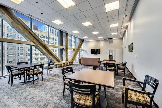 8 E Randolph St Unit 3007, Chicago, IL 60601 - dining area with carpet, a high ceiling, a drop ceiling, and expansive windows