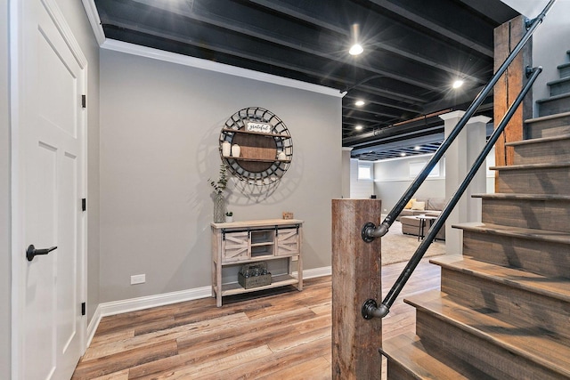 29990 Fehmarn Way, Genoa, IL 60135 - stairway featuring wood finished floors and ornamental molding