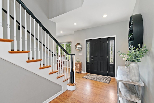 29990 Fehmarn Way, Genoa, IL 60135 - entryway with wood finished floors, recessed lighting, and stairway