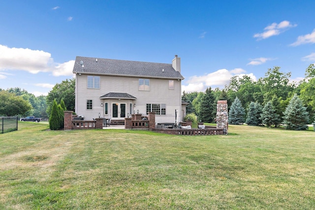 29990 Fehmarn Way, Genoa, IL 60135 - back of property featuring a chimney, a patio area, and french doors