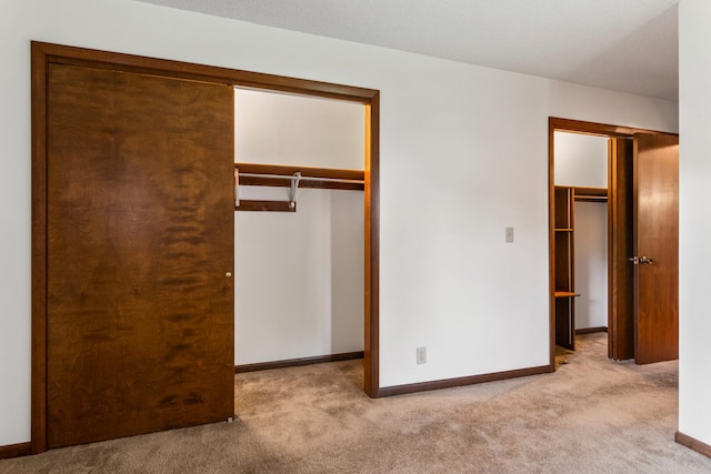 1803 Lyndhurst Dr, Savoy, IL 61874 - unfurnished bedroom with carpet flooring and a walk in closet
