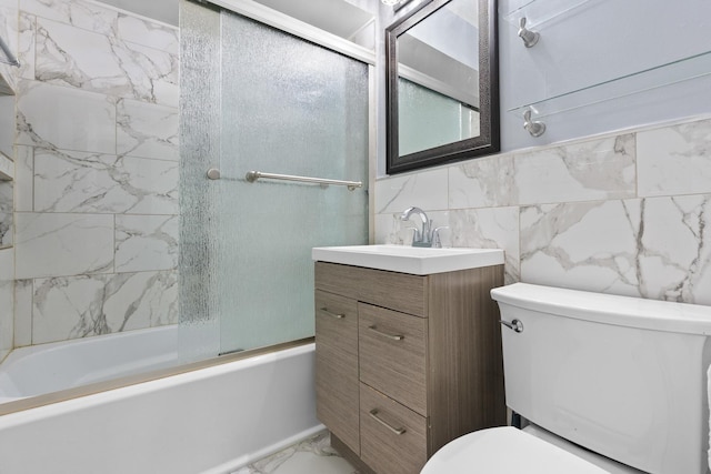17317 Roy St, Lansing, IL 60438 - full bathroom with bath / shower combo with glass door, marble look tiles, vanity, and tile walls
