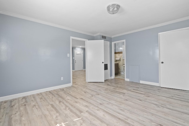 17317 Roy St, Lansing, IL 60438 - unfurnished bedroom featuring ornamental molding, light wood-type flooring, and ensuite bath