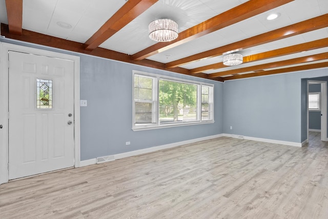 17317 Roy St, Lansing, IL 60438 - entrance foyer with beam ceiling, a chandelier, plenty of natural light, wood finished floors, and recessed lighting