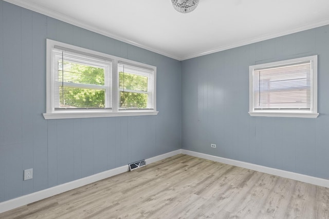 17317 Roy St, Lansing, IL 60438 - spare room featuring light wood-type flooring and crown molding