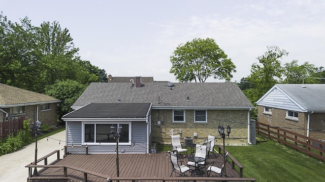 471 N W Ave, Elmhurst, IL 60126 - back of house featuring a wooden deck, a chimney, outdoor dining space, and a shingled roof