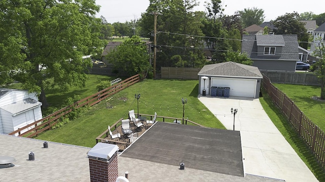 471 N W Ave, Elmhurst, IL 60126 - fenced backyard with an outbuilding and a detached garage