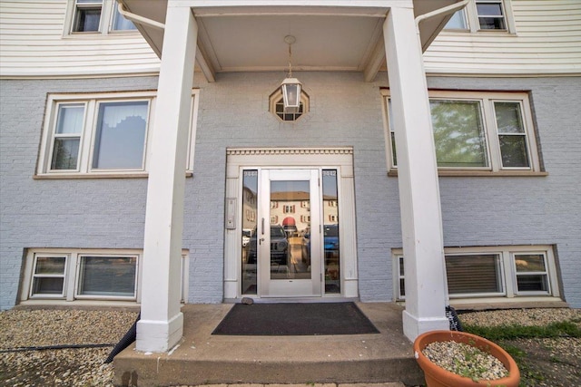9444 Kelvin Ln Unit A-3211, Schiller Park, IL 60176 - property entrance featuring brick siding
