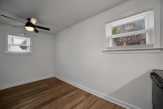 9444 Kelvin Ln Unit A-3211, Schiller Park, IL 60176 - empty room with wood finished floors, ceiling fan, and a textured ceiling
