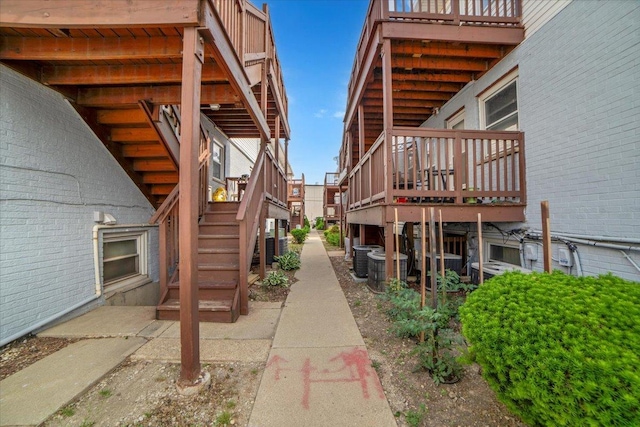 9444 Kelvin Ln Unit A-3211, Schiller Park, IL 60176 - view of side of home with stairway and a deck