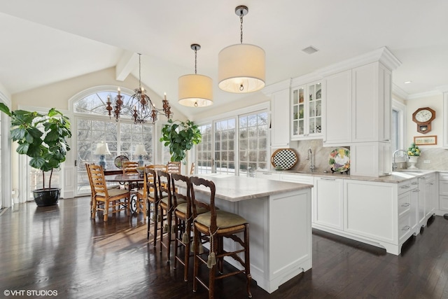 475 Red Fox Ln, Lake Forest, IL 60045 - kitchen with tasteful backsplash, white cabinets, and glass insert cabinets