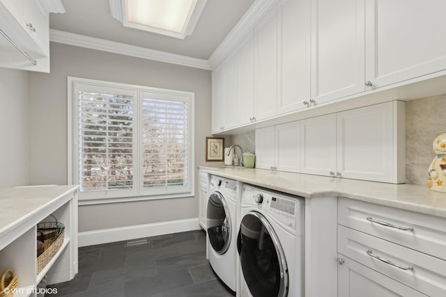475 Red Fox Ln, Lake Forest, IL 60045 - laundry area featuring washer and clothes dryer, ornamental molding, and cabinet space