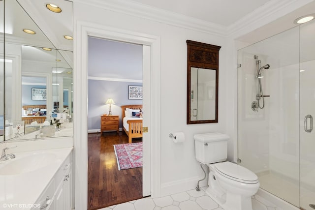 475 Red Fox Ln, Lake Forest, IL 60045 - bathroom with a stall shower, connected bathroom, vanity, ornamental molding, and recessed lighting