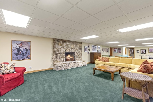 475 Red Fox Ln, Lake Forest, IL 60045 - living area featuring carpet floors, a stone fireplace, and a paneled ceiling