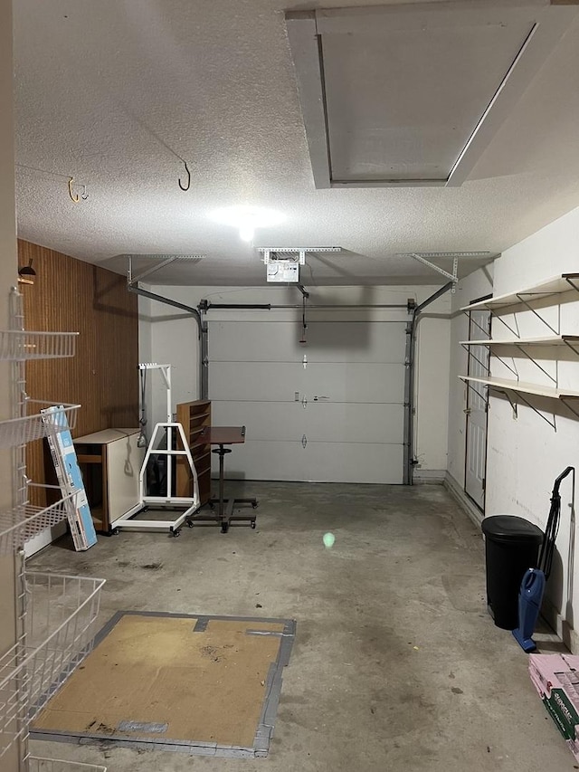 422 N 4th St, Cissna Park, IL 60924 - garage featuring a garage door opener