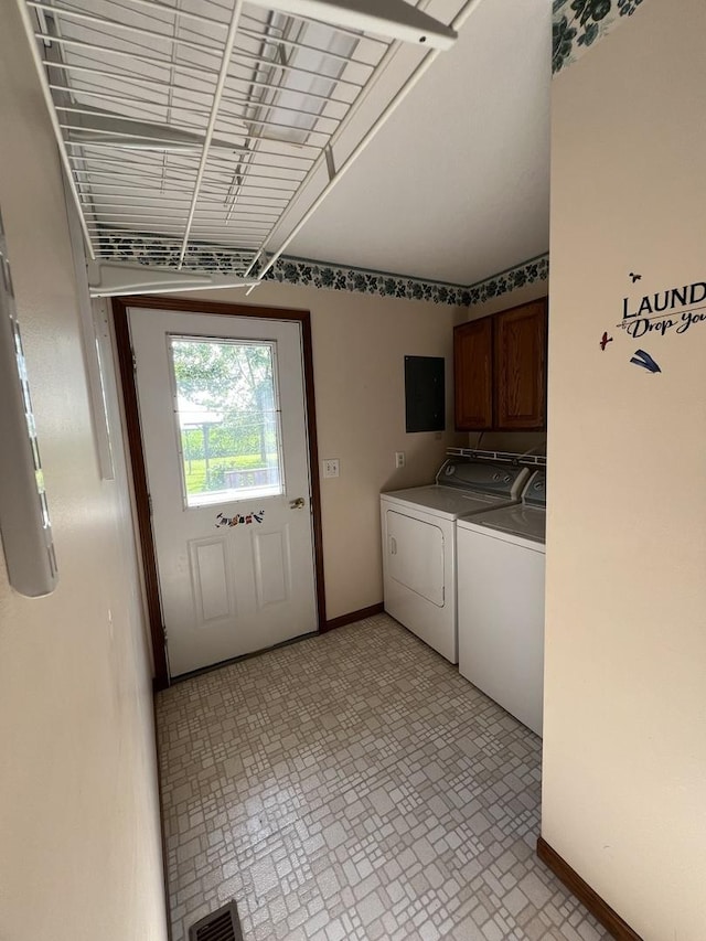 422 N 4th St, Cissna Park, IL 60924 - washroom with cabinet space, separate washer and dryer, brick patterned flooring, and electric panel