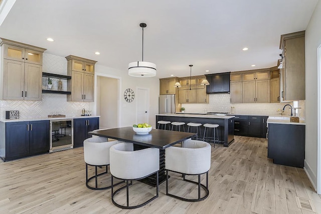1104 Walter St, Lemont, IL 60439 - dining area featuring beverage cooler, light wood-style floors, and recessed lighting