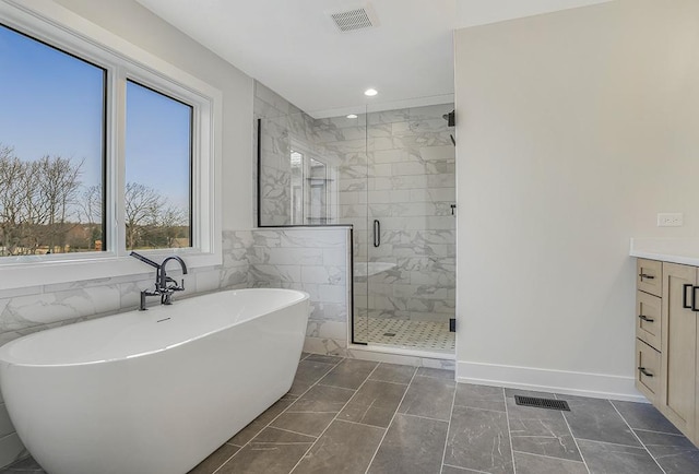 1104 Walter St, Lemont, IL 60439 - bathroom with a soaking tub, a stall shower, vanity, recessed lighting, and marble finish floors
