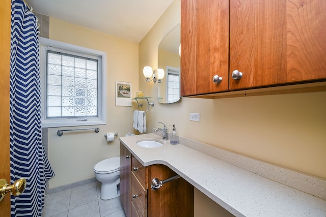 131 N Pierce Ave, Wheaton, IL 60187 - bathroom featuring plenty of natural light, vanity, tile patterned floors, and a shower with curtain