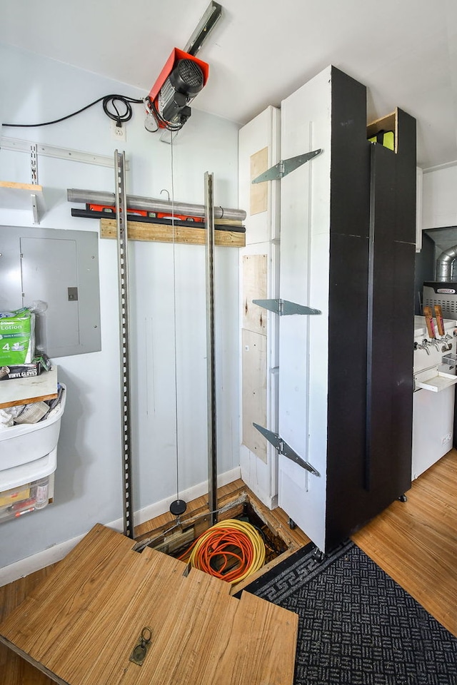 131 N Pierce Ave, Wheaton, IL 60187 - bathroom featuring wood finished floors and electric panel