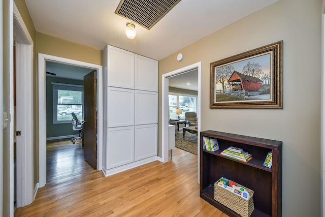 131 N Pierce Ave, Wheaton, IL 60187 - hallway with a desk and light wood-type flooring