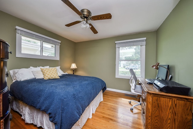 131 N Pierce Ave, Wheaton, IL 60187 - bedroom with multiple windows, wood finished floors, an office area, and ceiling fan