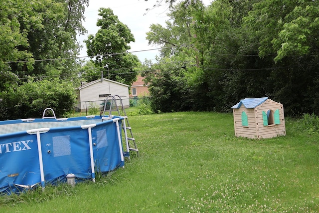 6807 S 79th Ave, Bridgeview, IL 60455 - view of yard featuring an outdoor pool