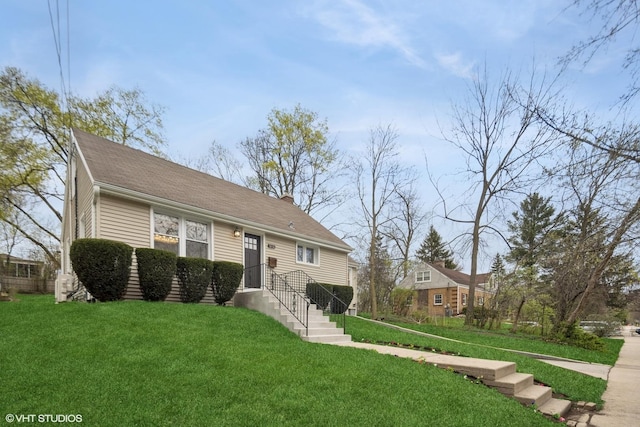 304 Bryant Ave, Glen Ellyn, IL 60137 - view of front facade featuring a front yard and a chimney