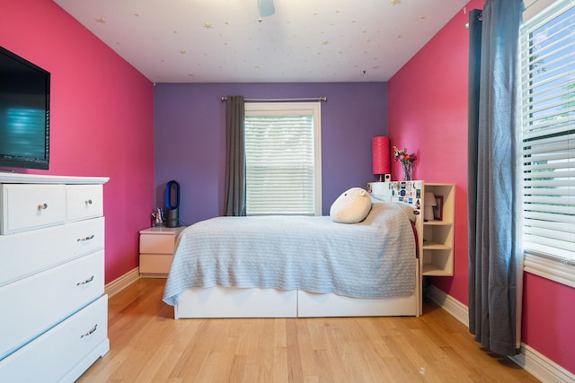 1024 Inverrary Ln Unit 1024, Deerfield, IL 60015 - bedroom with wood finished floors and ceiling fan