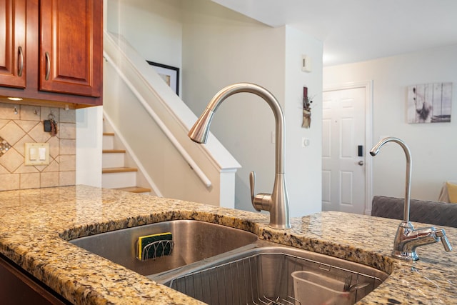 1024 Inverrary Ln Unit 1024, Deerfield, IL 60015 - kitchen with backsplash and light stone counters