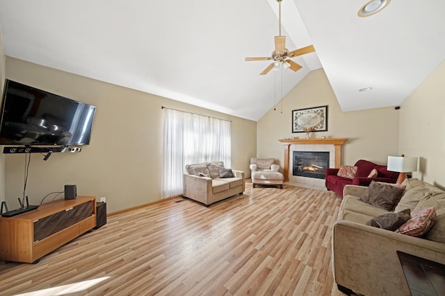 1654 Hilda Dr, Lake Holiday, IL 60548 - living area with light wood-type flooring, a fireplace, ceiling fan, and lofted ceiling