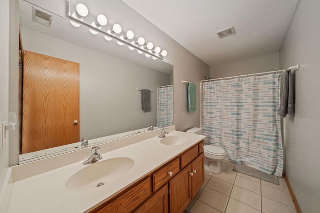 1654 Hilda Dr, Lake Holiday, IL 60548 - bathroom featuring double vanity, tile patterned floors, and a shower with curtain