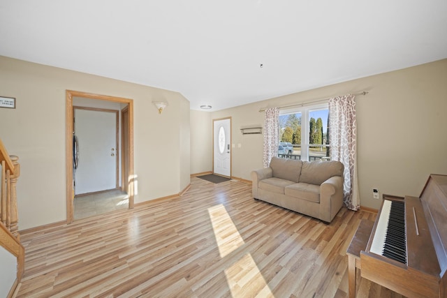 1654 Hilda Dr, Lake Holiday, IL 60548 - living area with light wood-type flooring and stairway