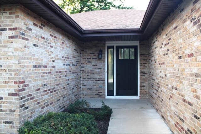 3042 Bar Harbour Rd, Aurora, IL 60504 - view of exterior entry with brick siding and roof with shingles