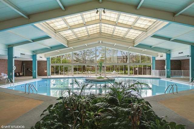 701 Forum Sq Unit 602, Glenview, IL 60025 - indoor community pool featuring a patio and glass enclosure