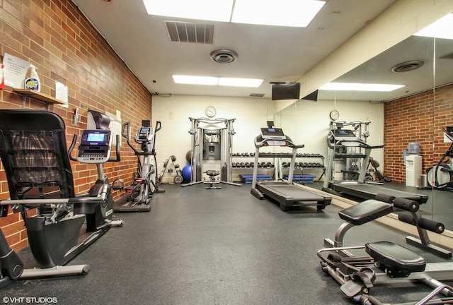 701 Forum Sq Unit 602, Glenview, IL 60025 - workout area featuring brick wall