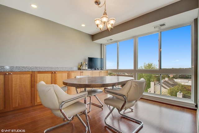 701 Forum Sq Unit 602, Glenview, IL 60025 - dining room featuring a chandelier, wood finished floors, and recessed lighting