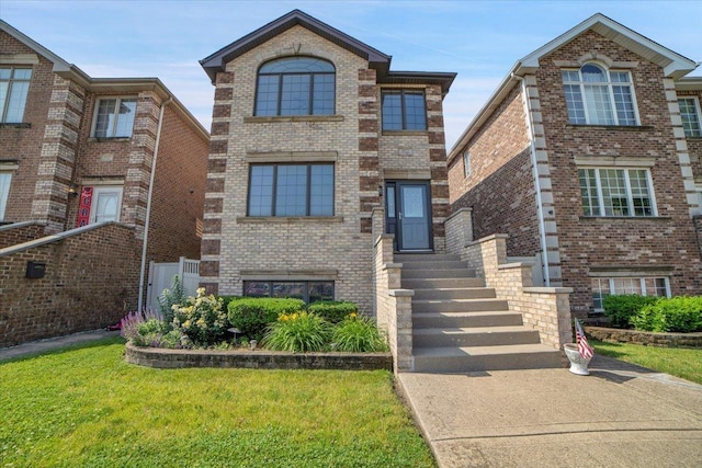 6825 W 64th Pl, Chicago, IL 60638 - traditional home featuring brick siding and a front lawn
