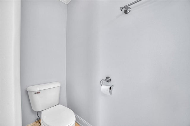 6825 W 64th Pl, Chicago, IL 60638 - bathroom featuring toilet and baseboards