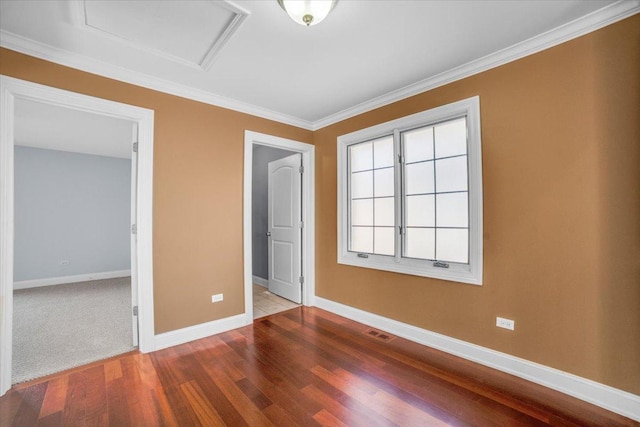 6825 W 64th Pl, Chicago, IL 60638 - unfurnished bedroom featuring wood finished floors, attic access, and crown molding