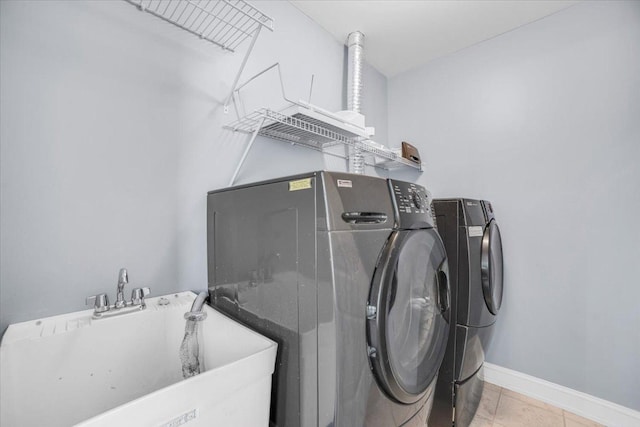 6825 W 64th Pl, Chicago, IL 60638 - laundry room with separate washer and dryer, tile patterned flooring, and pet washing area