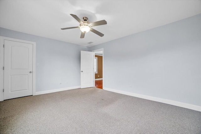 6825 W 64th Pl, Chicago, IL 60638 - unfurnished room with carpet floors and a ceiling fan