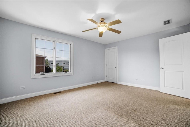 6825 W 64th Pl, Chicago, IL 60638 - carpeted spare room with a ceiling fan and baseboards