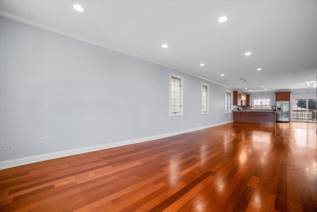 6825 W 64th Pl, Chicago, IL 60638 - unfurnished living room with ornamental molding, recessed lighting, and dark wood-style floors
