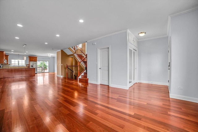 6825 W 64th Pl, Chicago, IL 60638 - unfurnished living room with stairs, wood finished floors, recessed lighting, and ornamental molding