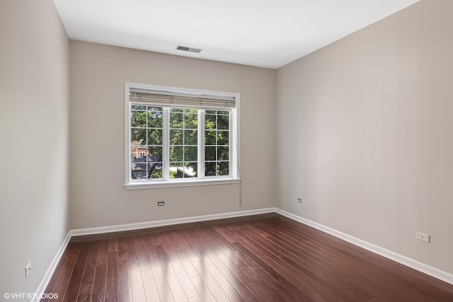 501 Forest Ave Unit 305, Glen Ellyn, IL 60137 - unfurnished room featuring dark wood-style flooring and baseboards