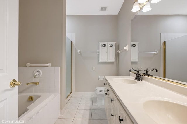 501 Forest Ave Unit 305, Glen Ellyn, IL 60137 - bathroom featuring a garden tub, double vanity, and an enclosed shower